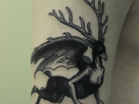 Татуировка летящий олень