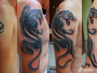 Татуировка зверь на плече