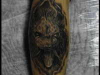 Татуировка морда льва