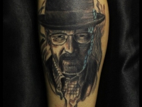Татуировка портрет на икре