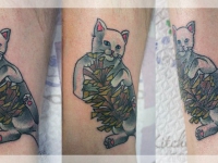 Татуировка кот с шишкой