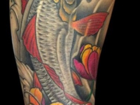 Татуировка рыбка на голеностопе