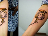 Татуировка часы на руке