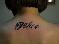 Татуировка надпись на спине