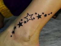 Татуировка звезды на голеностопе
