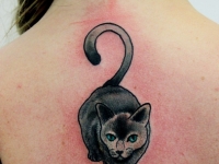 Татуировка кошка на спине