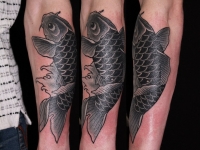 Татуировка рыба на предплечье