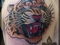Татуировка тигр на плече