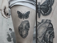Татуировка - из середины сердца вылетела бабочка