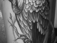 Татуировка индейка на бедре