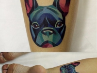 Татуировка собака на икре
