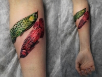 Татуировка рыбы на предплечье