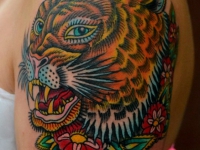 Татуировка ягуар на плече
