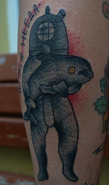 Дельфин в татуировке