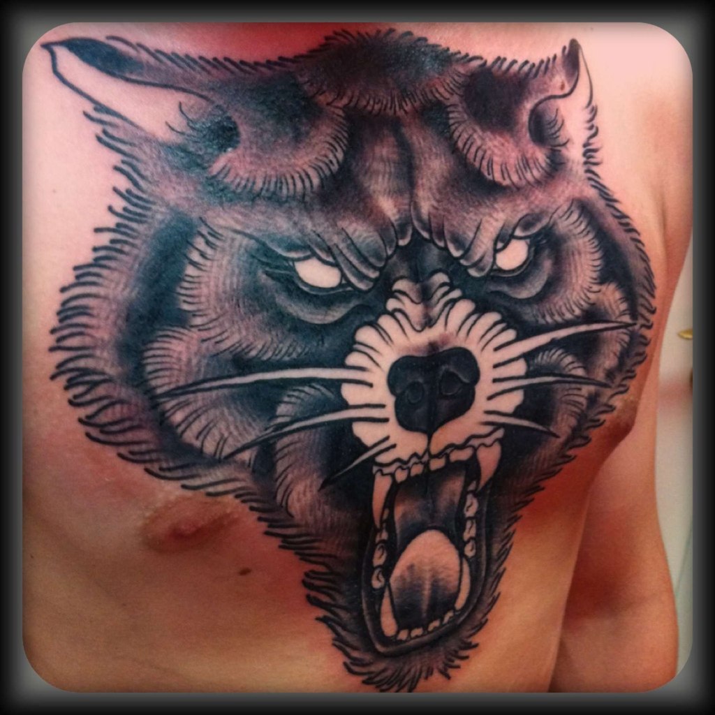 татуировка с волком