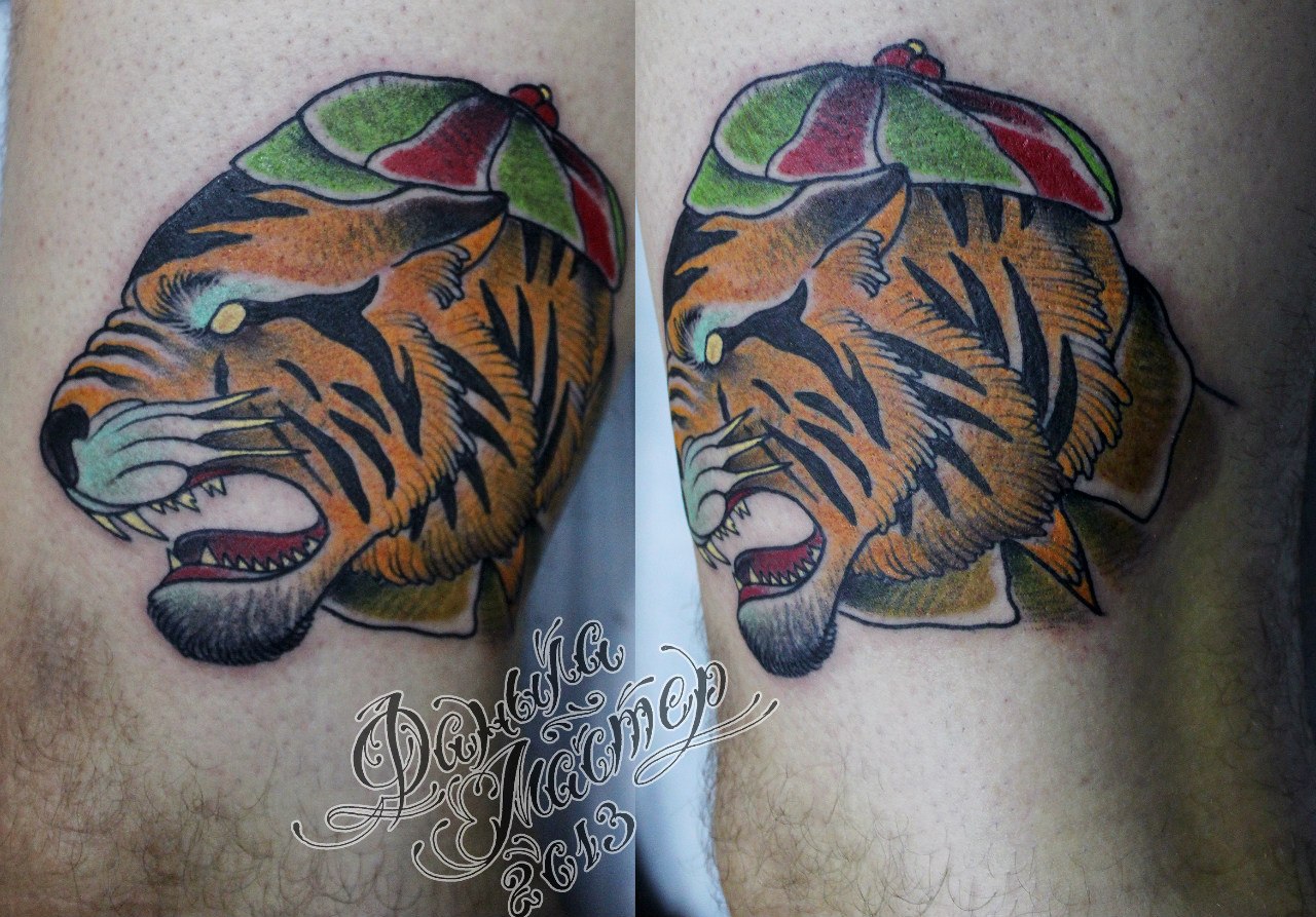 Художественная татуировка "Тигр в кепке" от Даниила Шумкова
