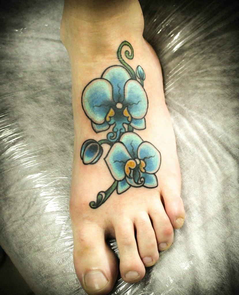 Художественная татуировка "Орхидея" в исполнении Ксении Волчок.